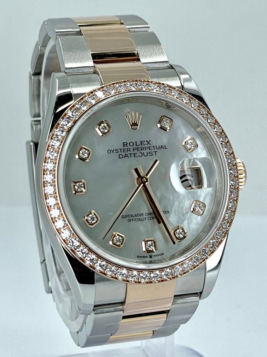 May be an image of wrist watch and text that says 'EDPERPETUAL ROLEX ROLEXTUAL ROL ERPE RPETUAL OYSTER OYSTERPERPETUAL RPERPETU DATEJUST DAT TER SUPERLATIVE CHR OFFICIALLY CIALLY'