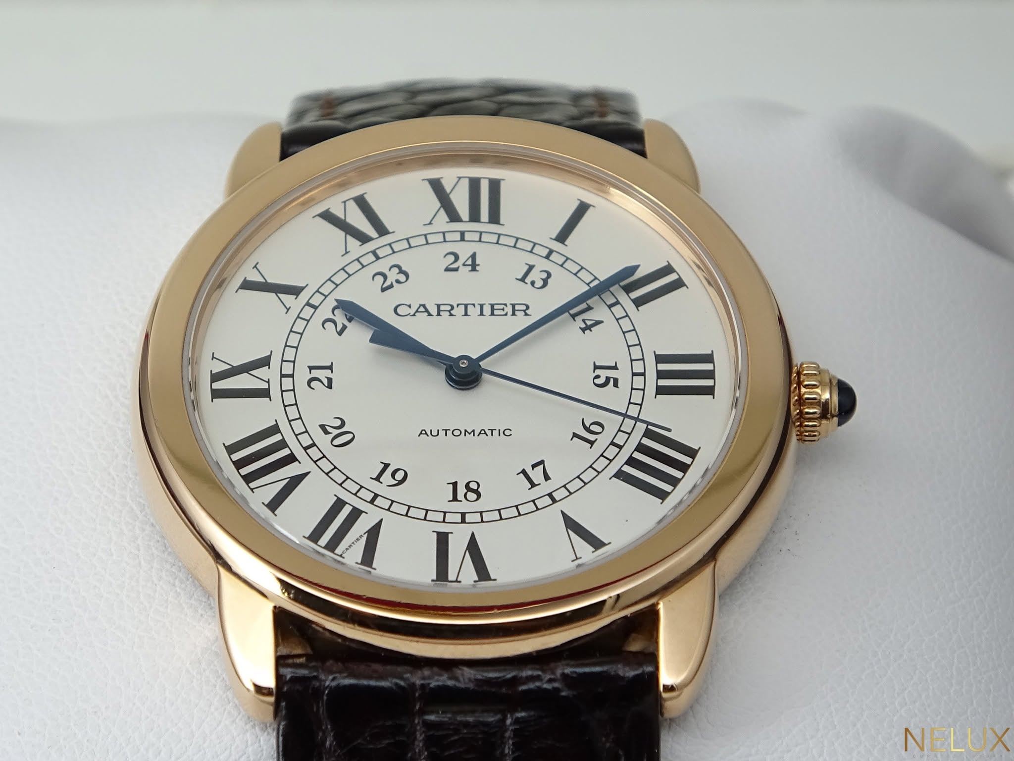 May be an image of wrist watch and text