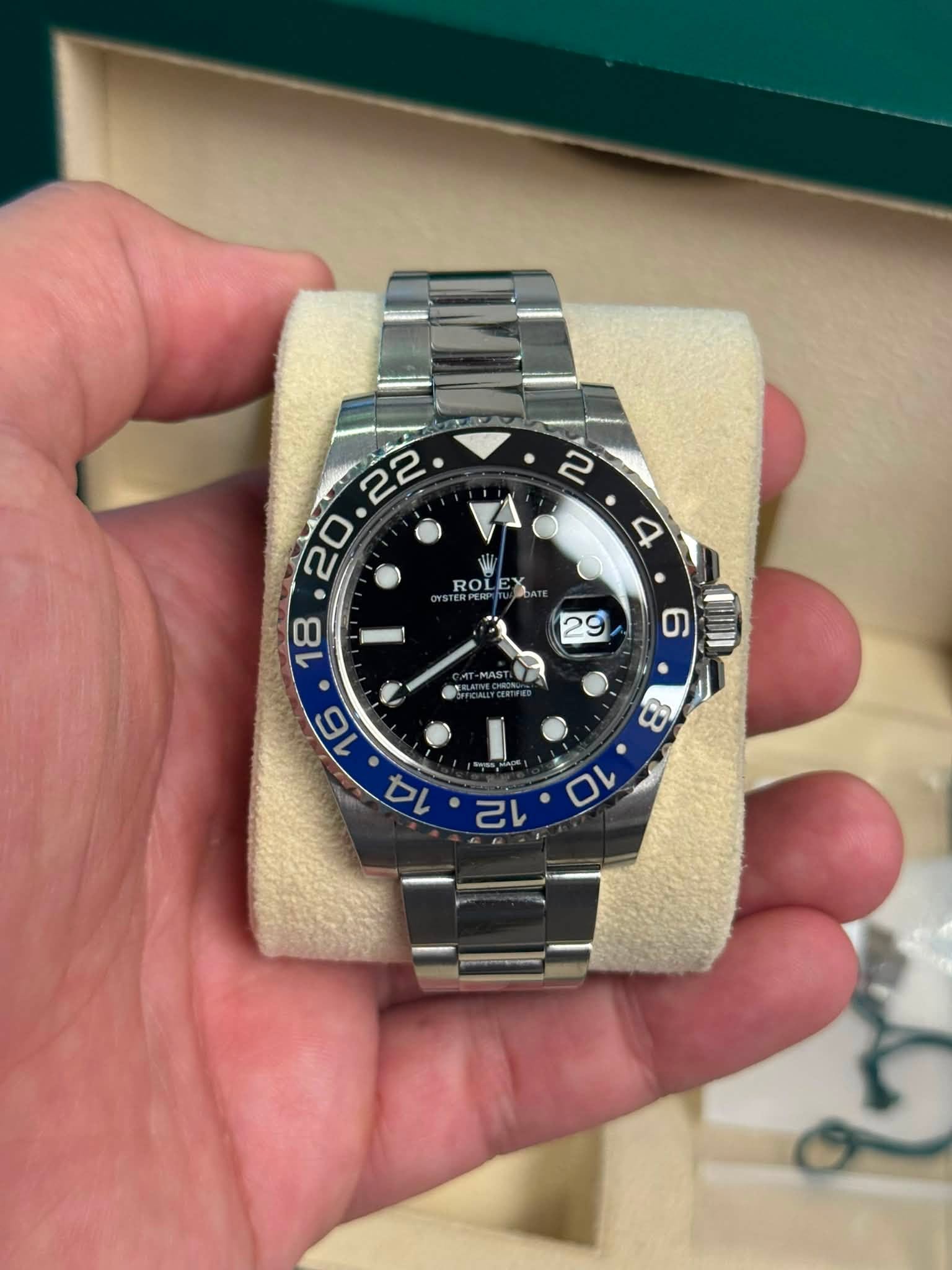 May be an image of wrist watch and text that says 'ROLEX 0 RO 22 2 20 A '