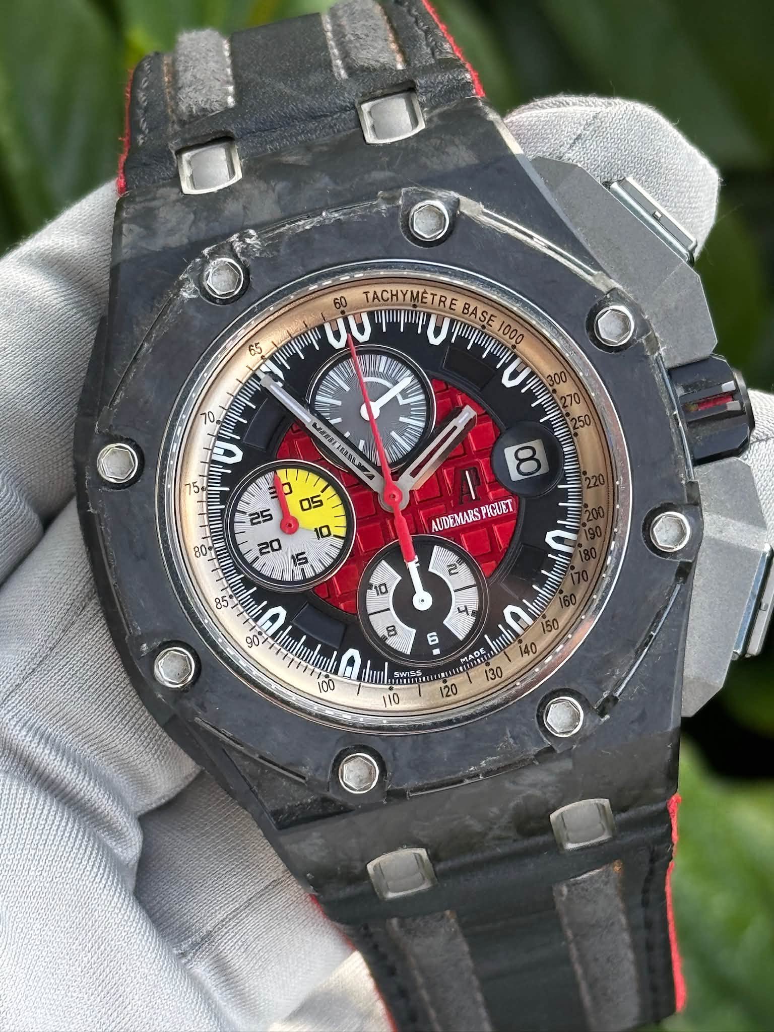 May be an image of wrist watch and text