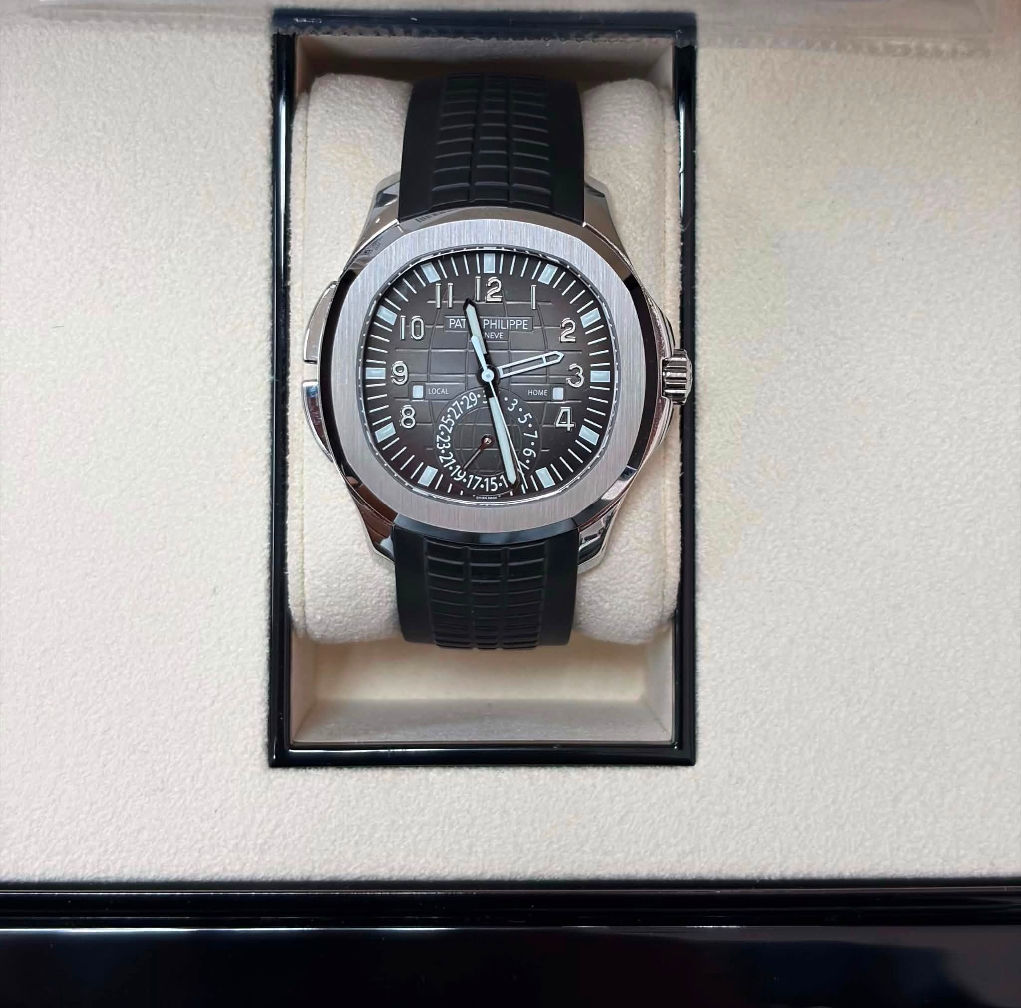 May be an image of wrist watch and text that says '2 I1 0- ገ- PAT PHIUPP સમ| ILIPP M NEVE ቢ O ዓ T 30AL 27 -29 CA ၁ာ o HOMT ي A • တ% "יי - L'