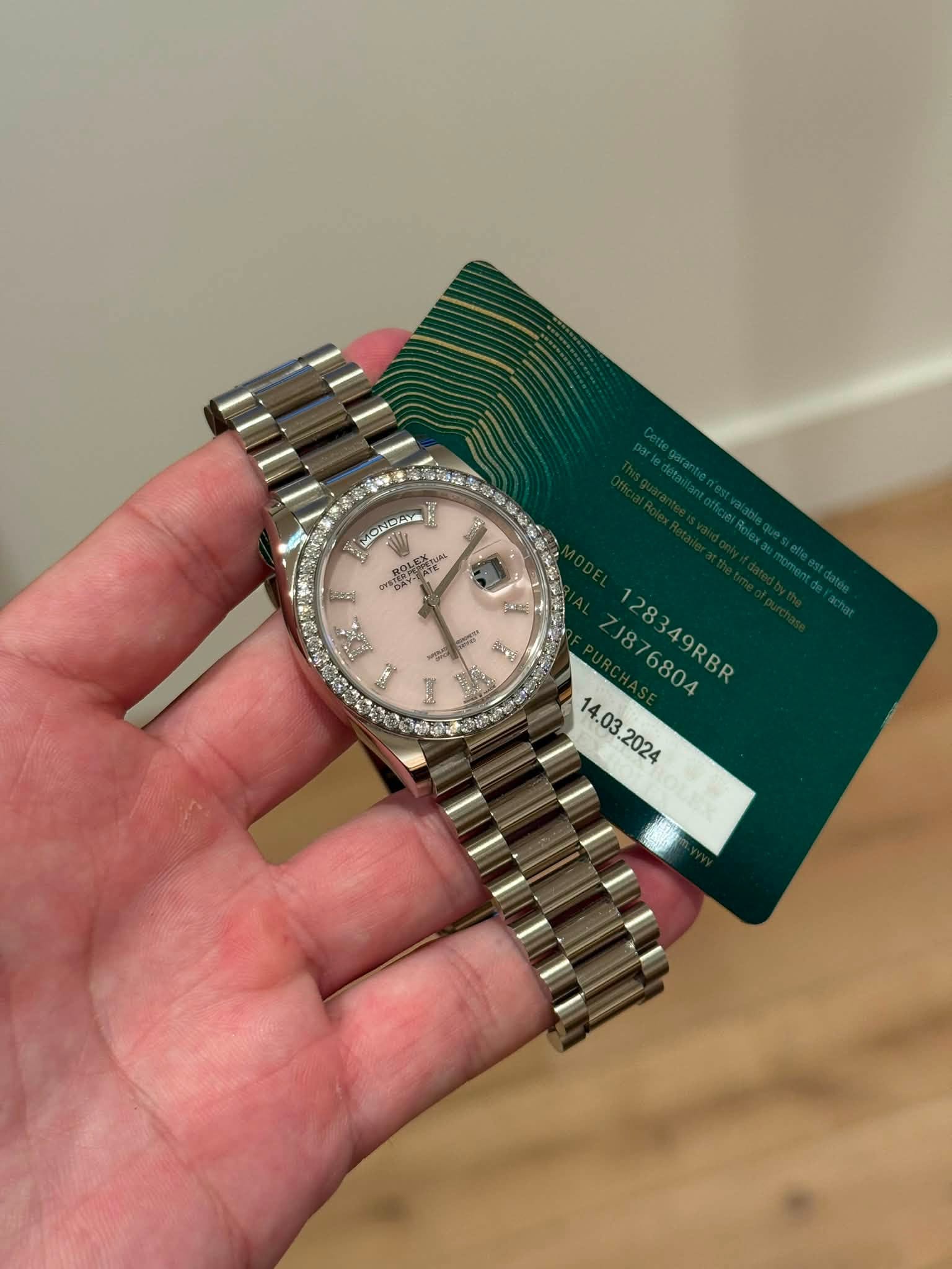 May be an image of wrist watch and text
