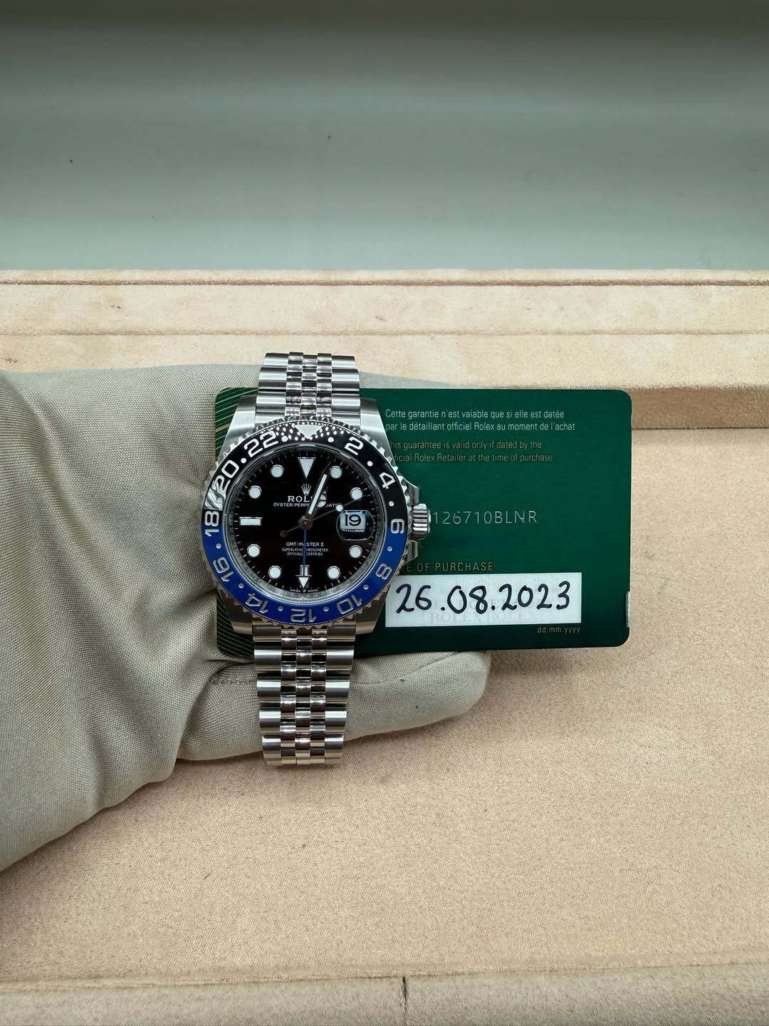 May be an image of wrist watch and text