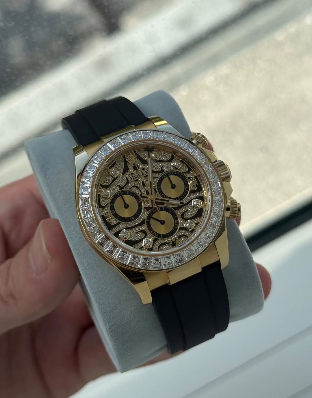 May be an image of wrist watch and text