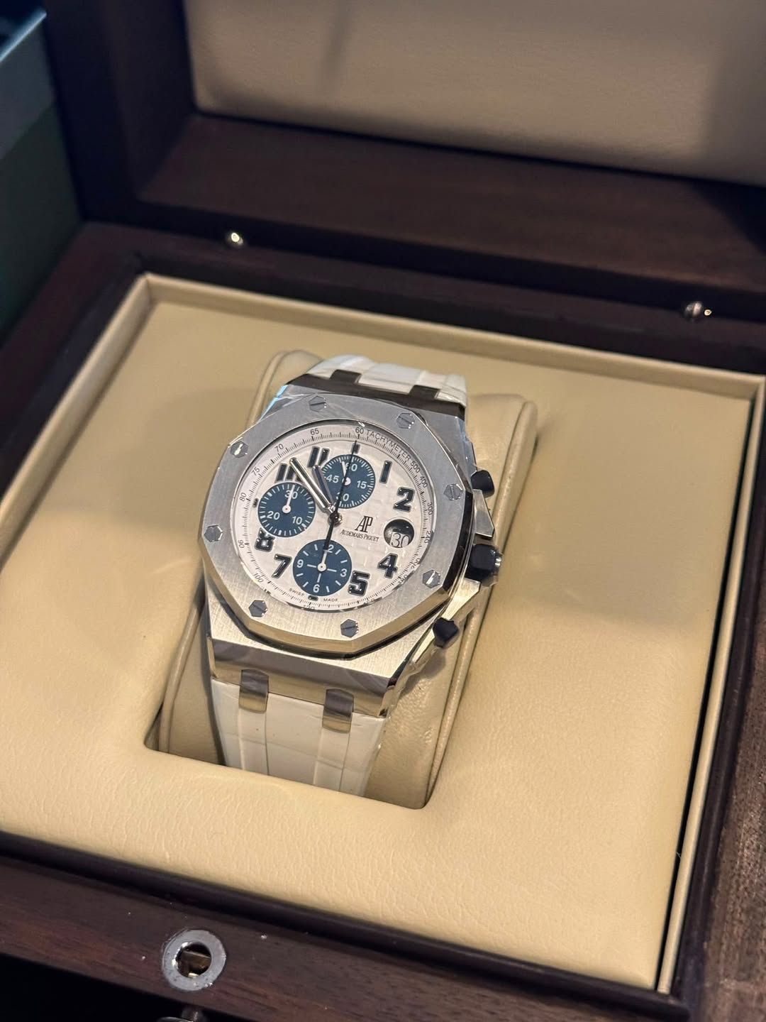 May be an image of wrist watch and text