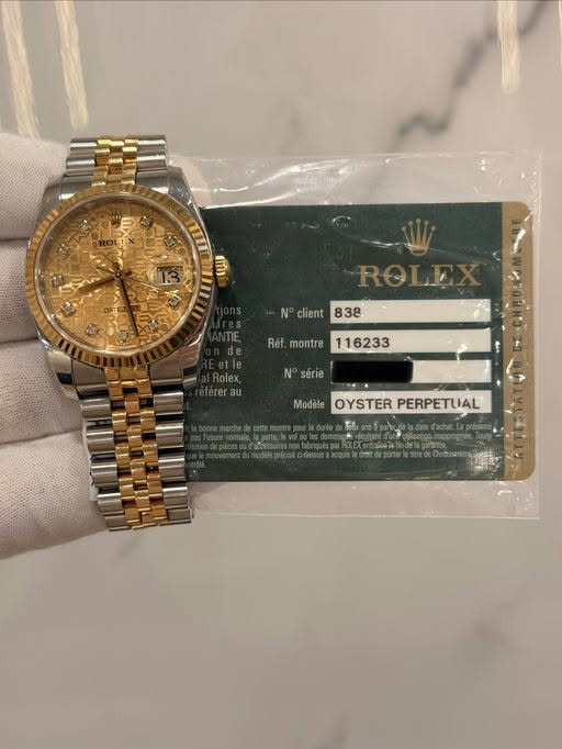 May be an image of wrist watch and text that says 'ms N client 838 Réf. montre 116233 N° série Modele OYSTER PERPETUAL'