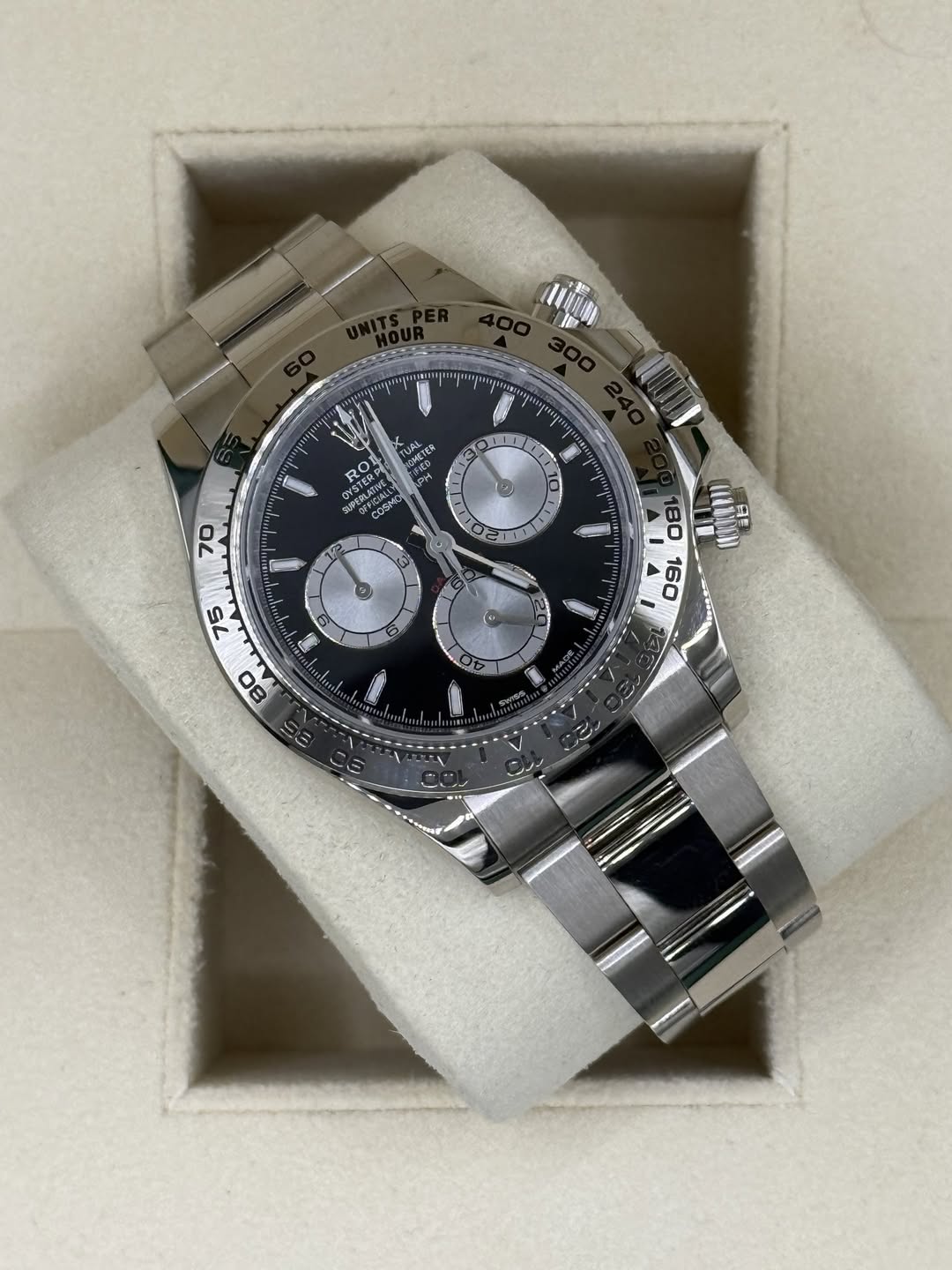 May be an image of wrist watch and text