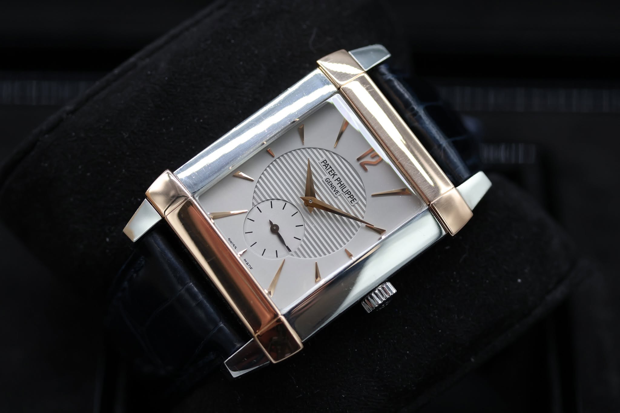 May be an image of wrist watch and text
