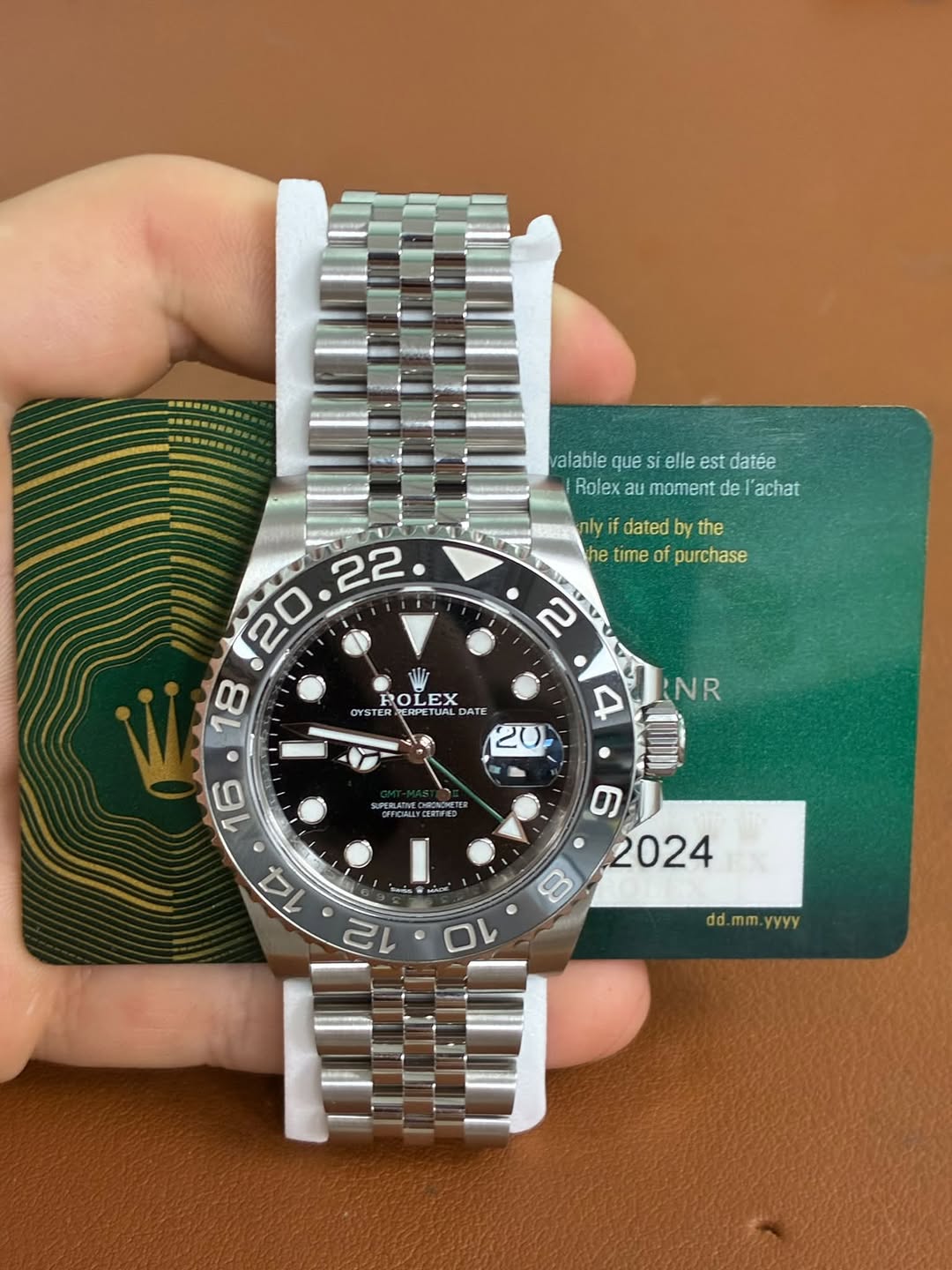 May be an image of wrist watch and text that says 'valable que valabilequesielleestdatée i elle est datée Role au moment de 'achat y nlyfdatedbythe if dated the he time of…