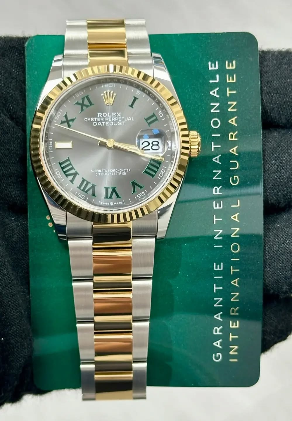 May be an image of wrist watch and text that says '601 5 50 XI 55/ I ROLEX OYSTER YSTERPERPE RPERPETUAL ETUAL DATEJUST 28 WAΠ CETCALLECERTIFED Ot UPERLATIVE CHRONCHETER S0 I VI…
