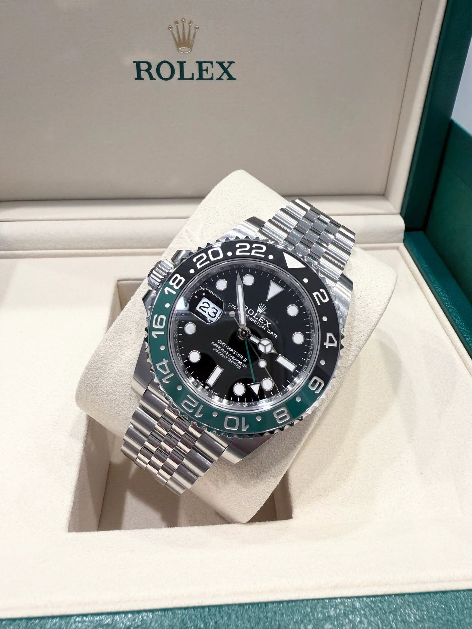 May be an image of wrist watch and text