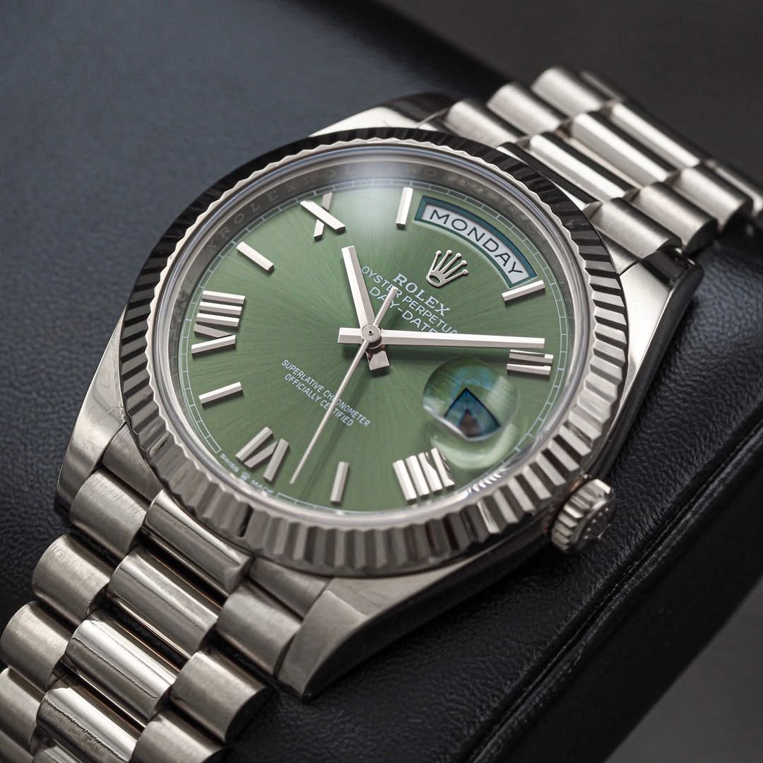 May be an image of wrist watch and text