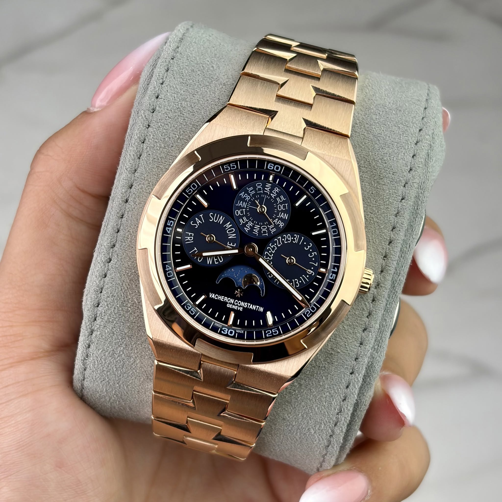 May be an image of wrist watch and text