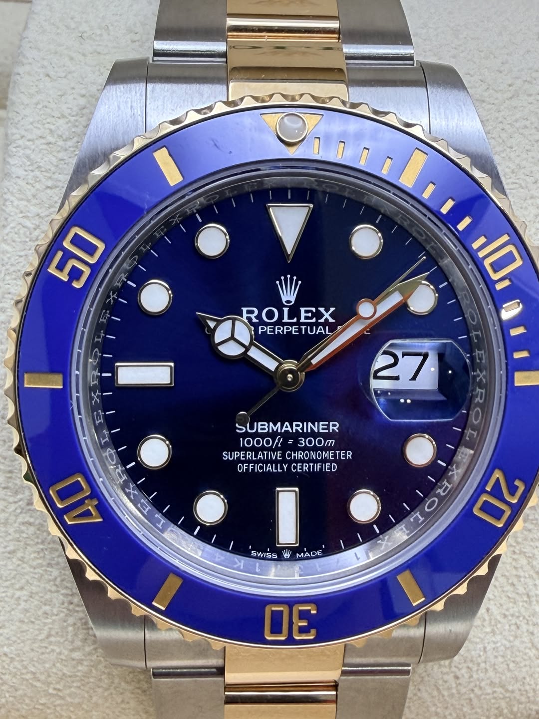 May be an image of wrist watch and text that says '50 ROLEX PERPETUAL 10 27 SUBMARINER 1000ft 300m SUPERLATIVE CHRONOMETER OFFICIALLY OFFICIALLYCERTIFIED CERTIFIED I SWISS 밤 MADE I…