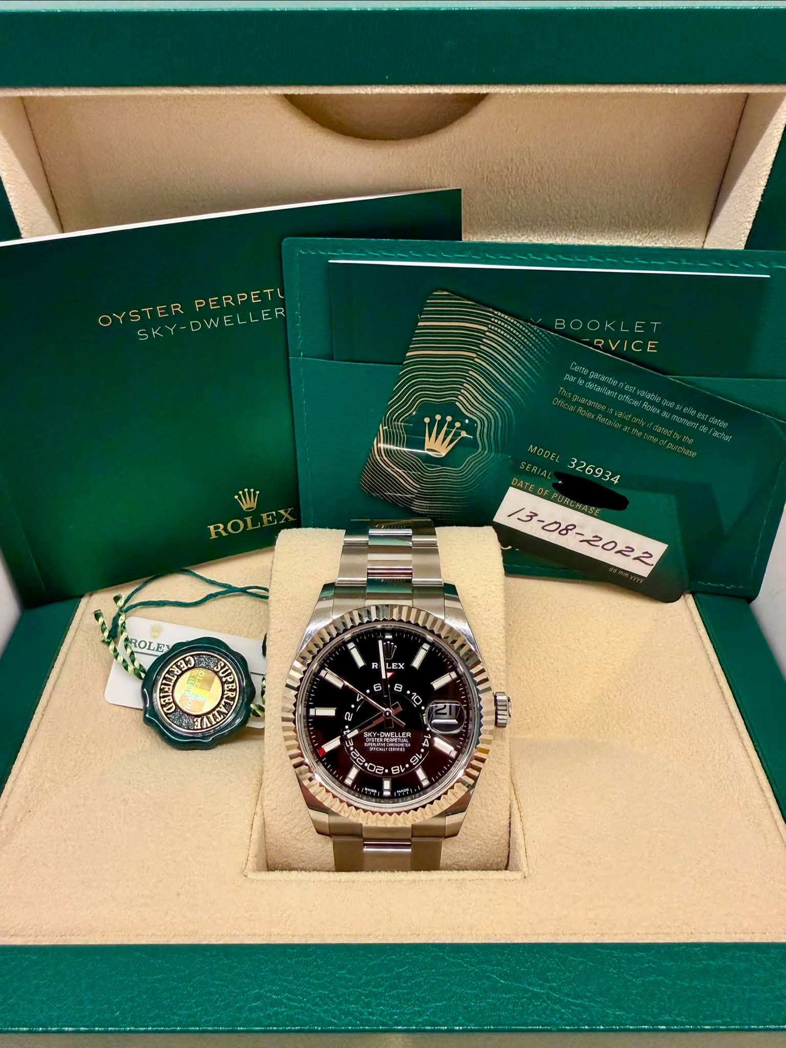 May be an image of wrist watch and text that says 'OYSTER OYSTERPERPETI SKY-DWELLER DWELLER PERPETU -RVICE W ROI MODEL AROLE CEELERER 3C SUP .일 ATIN LE E 一 お 10 Ππ የጉትማ , E R U'