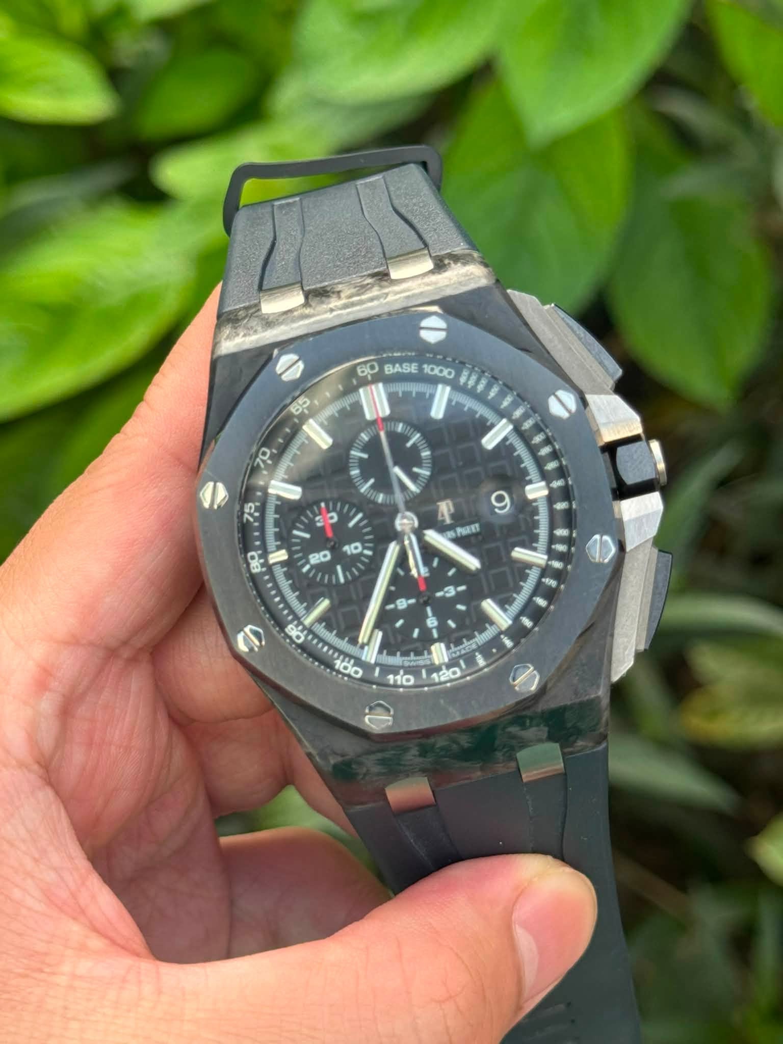 May be an image of wrist watch and text
