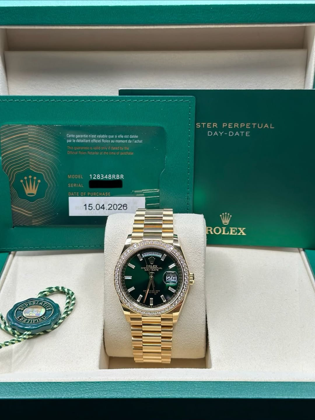 May be an image of wrist watch and text