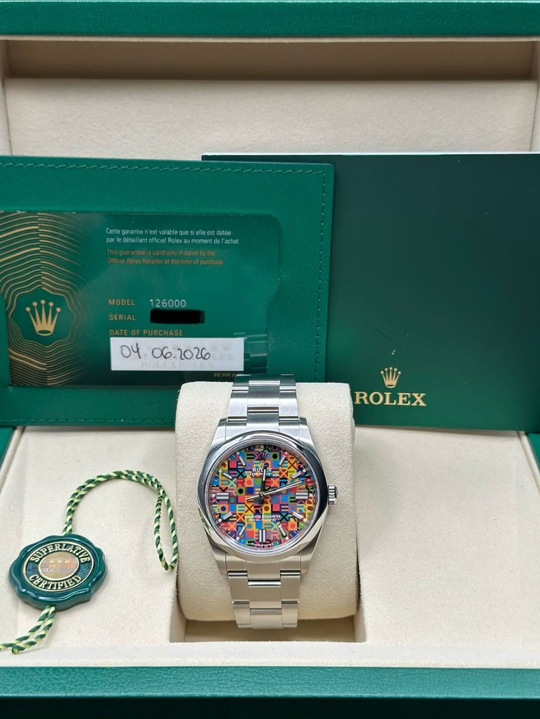 May be an image of wrist watch and text