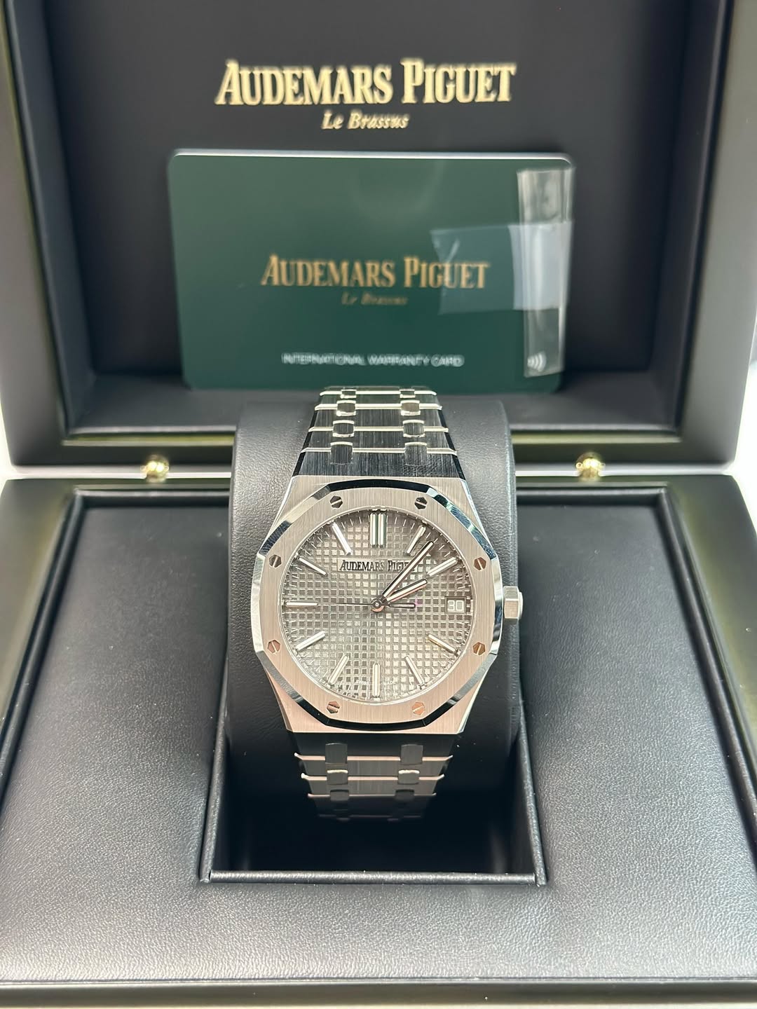May be an image of wrist watch and text