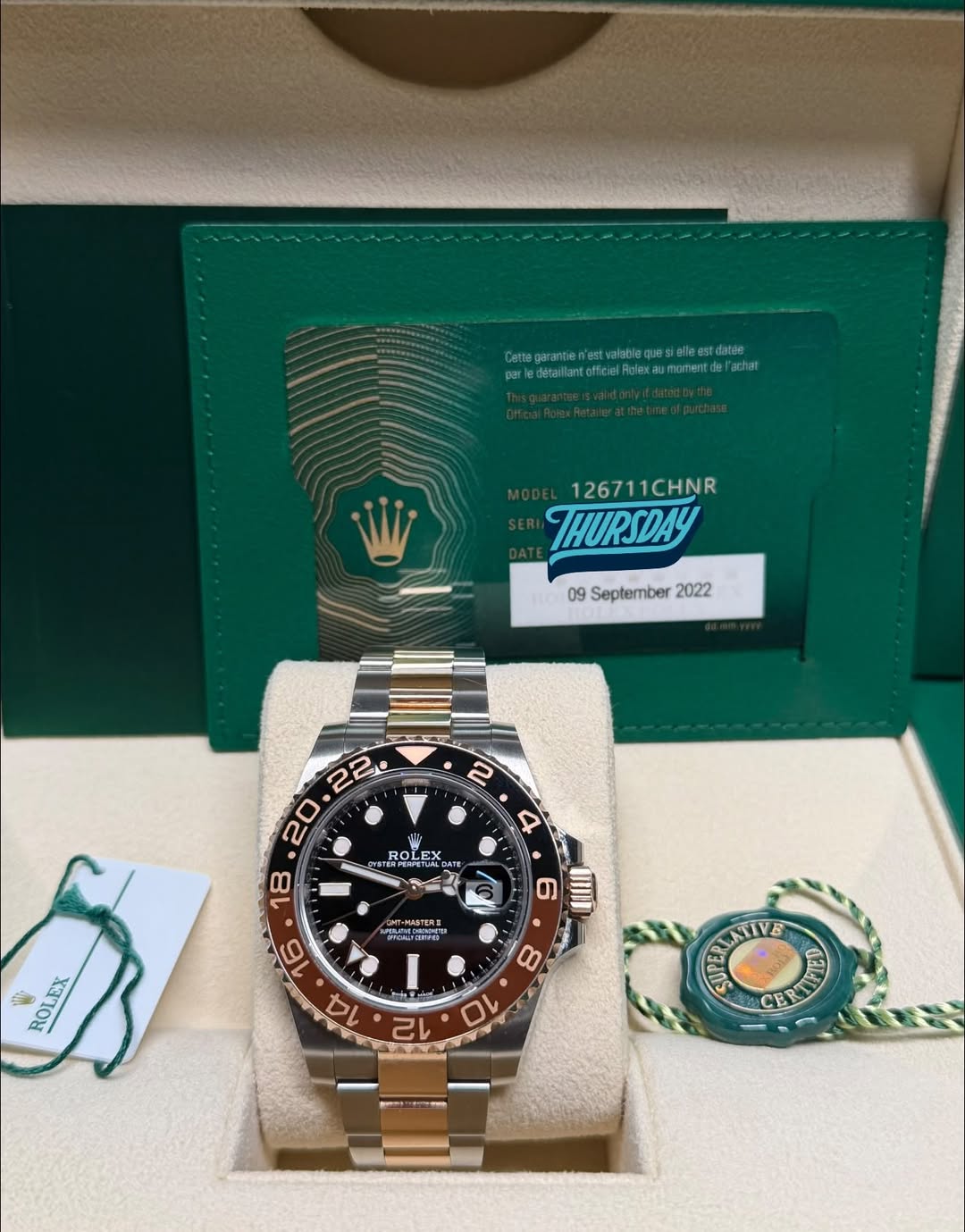 May be an image of wrist watch and text