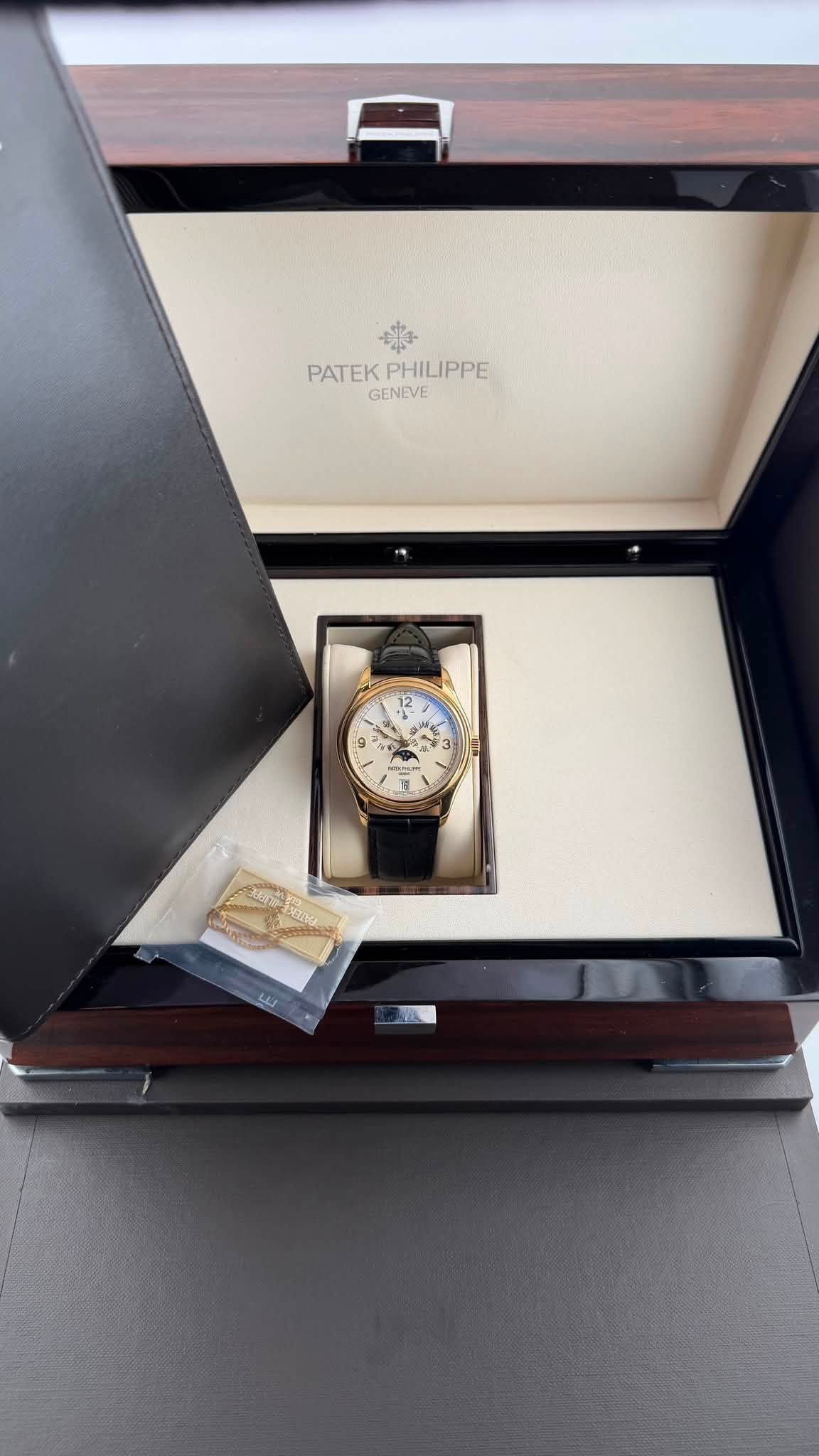 May be an image of wrist watch and text