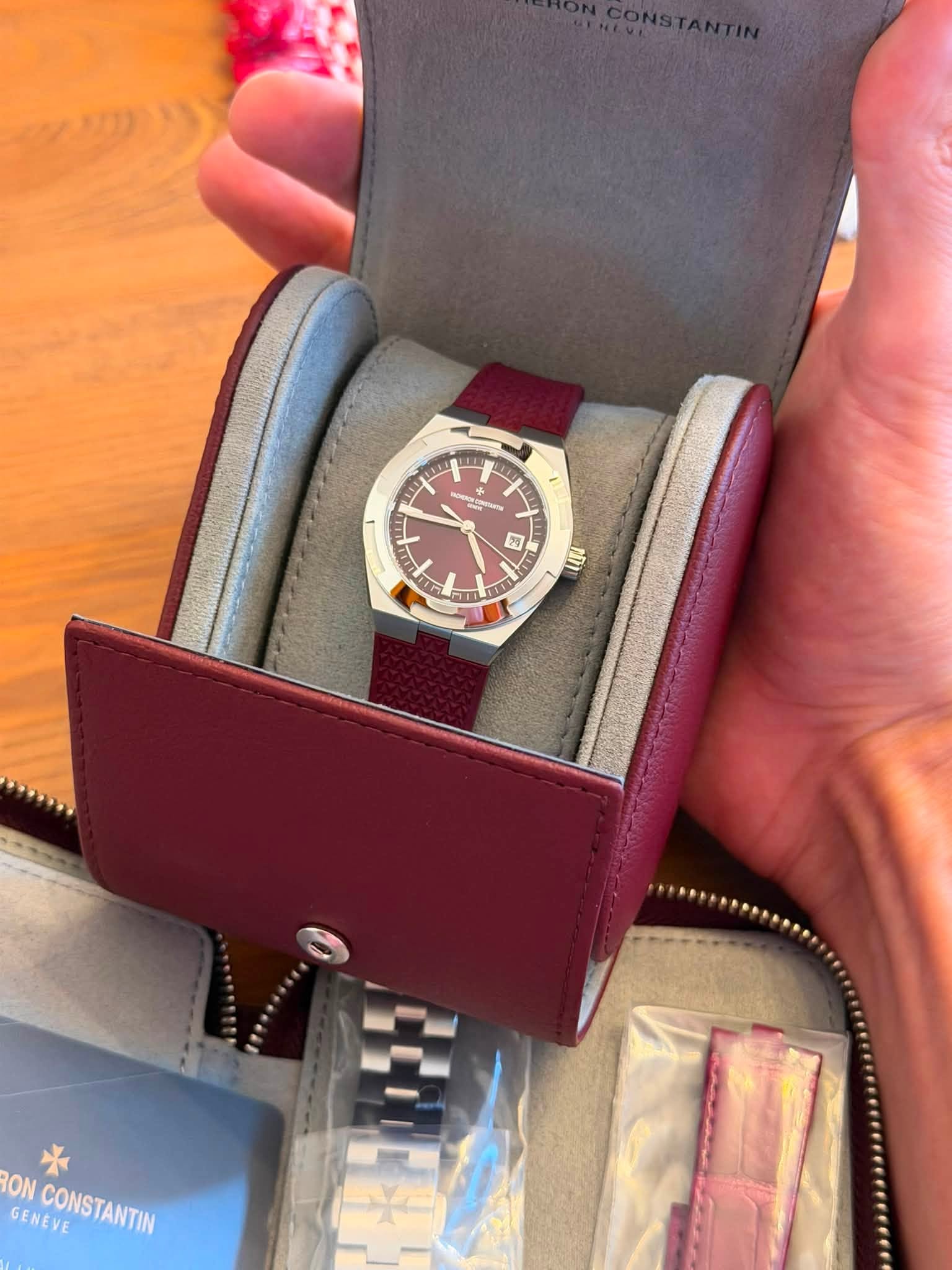 May be an image of wrist watch and text