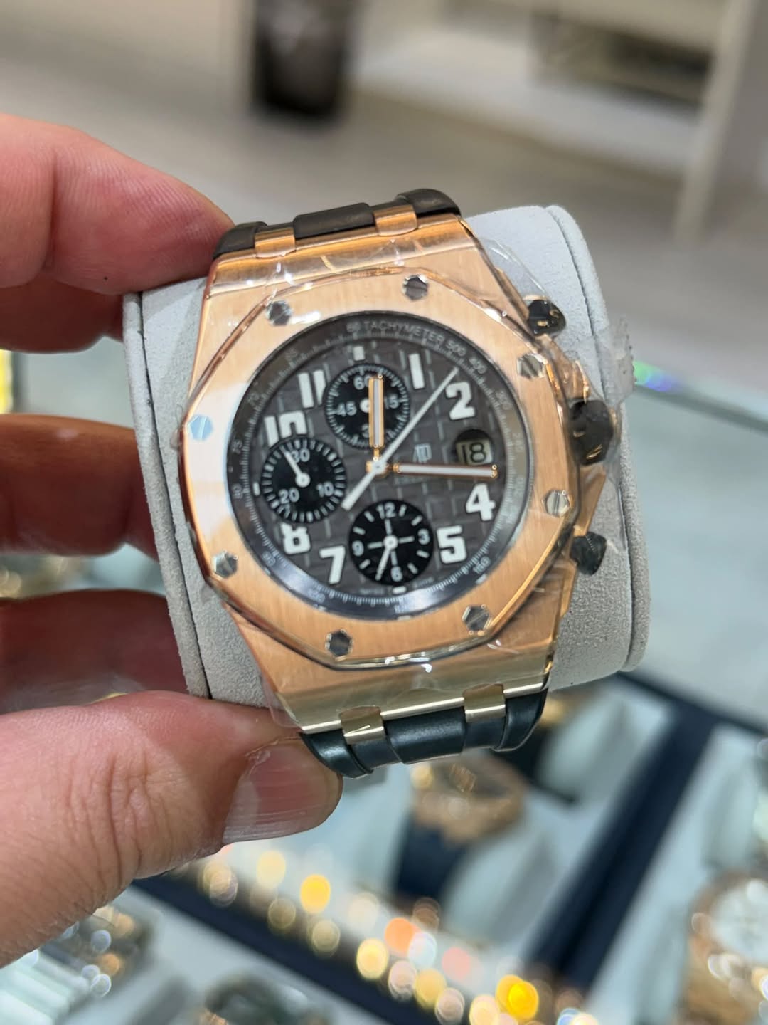 May be an image of wrist watch and text
