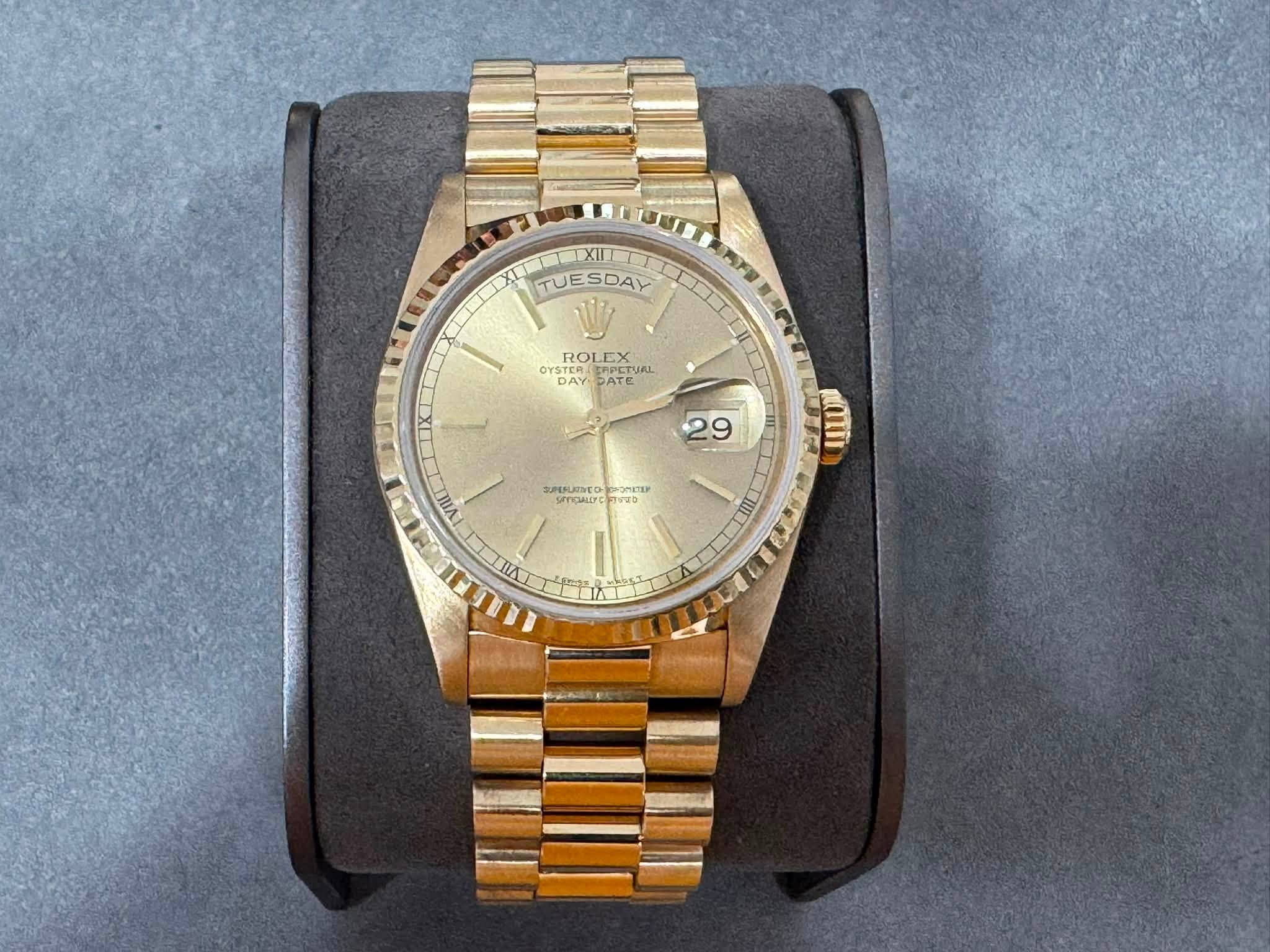 May be an image of wrist watch and text