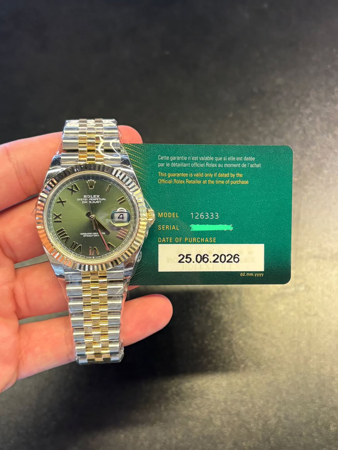 May be an image of wrist watch and text that says 'Cette arantie n'est V8 Caemegeateiaee lable que siblle estdatée par prledeailattiniciteni détaillantofficiel Rolen momantda achat…