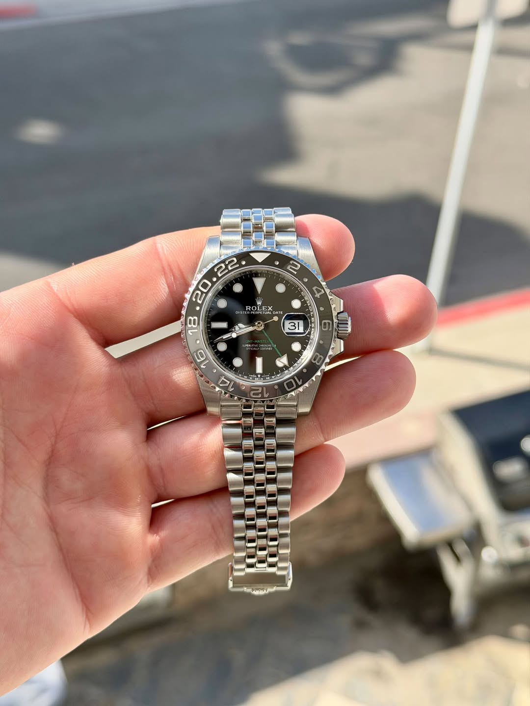 May be an image of wrist watch and text that says ' ROLE OLEL DN O സി'
