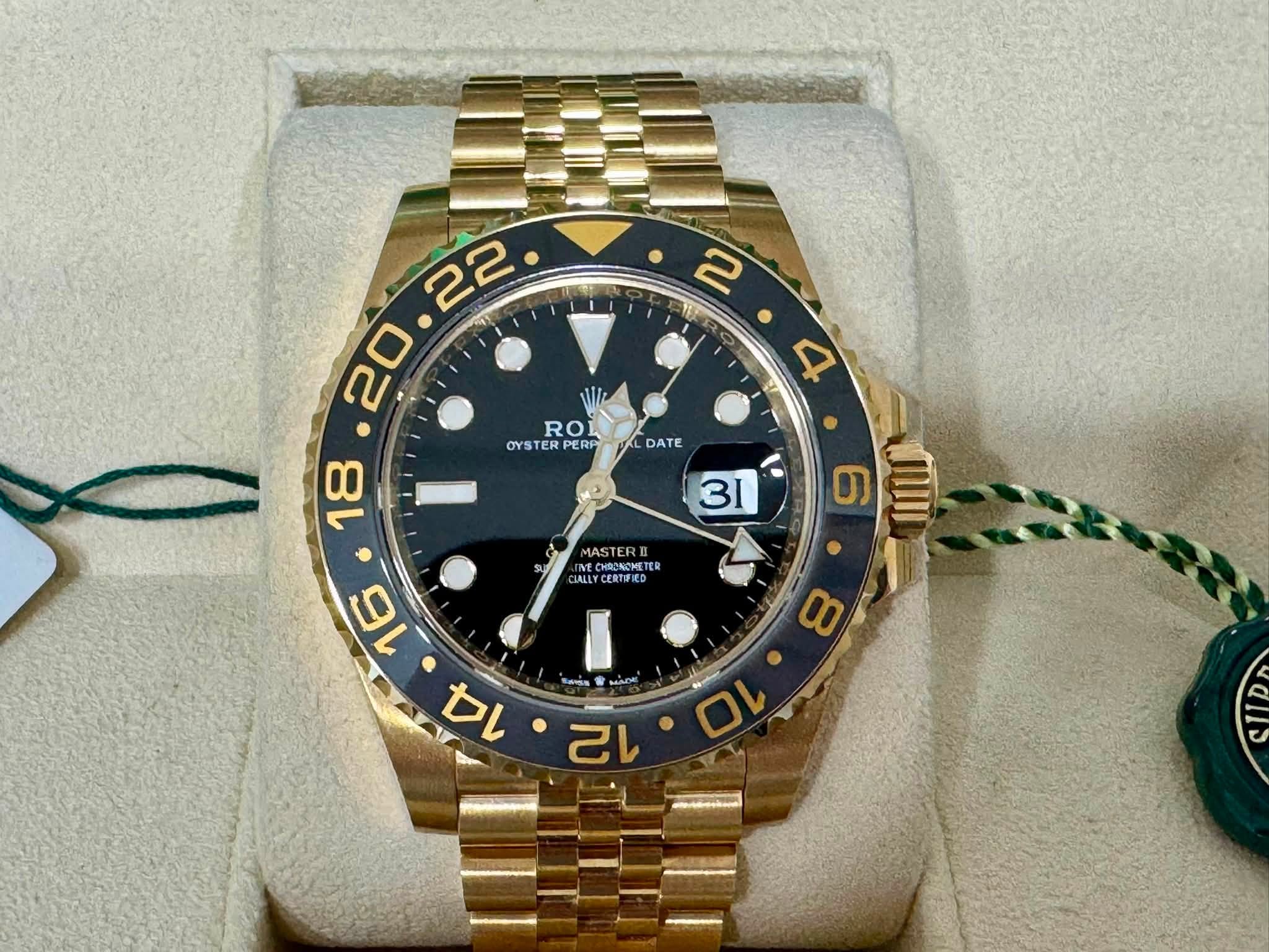 May be an image of wrist watch and text