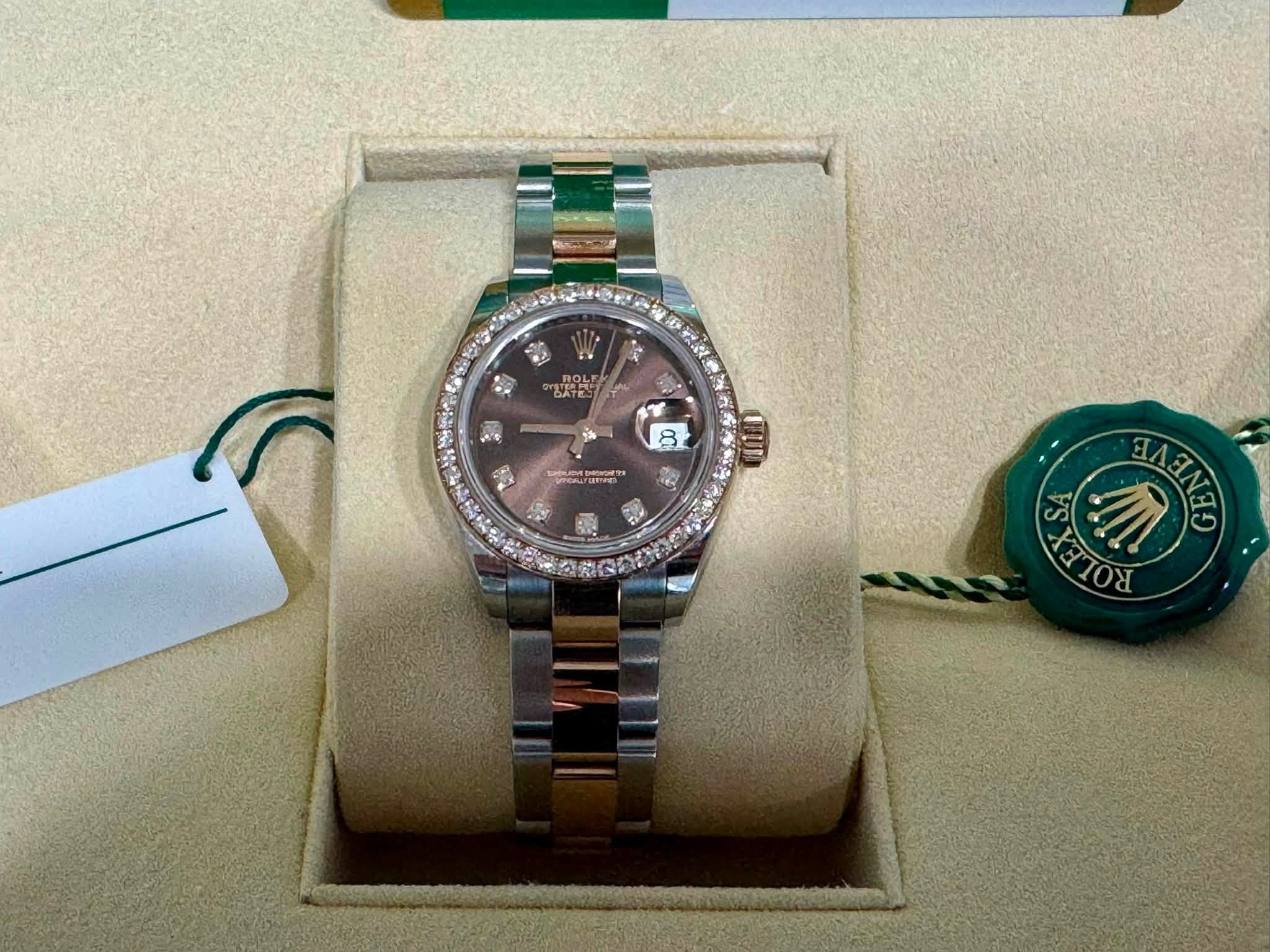 May be an image of wrist watch and text