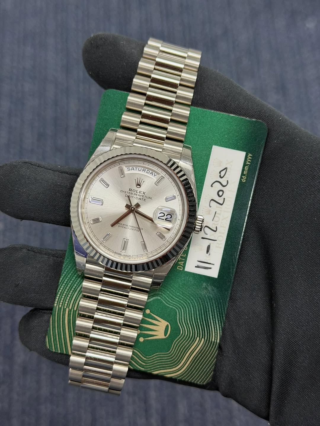 May be an image of wrist watch and text