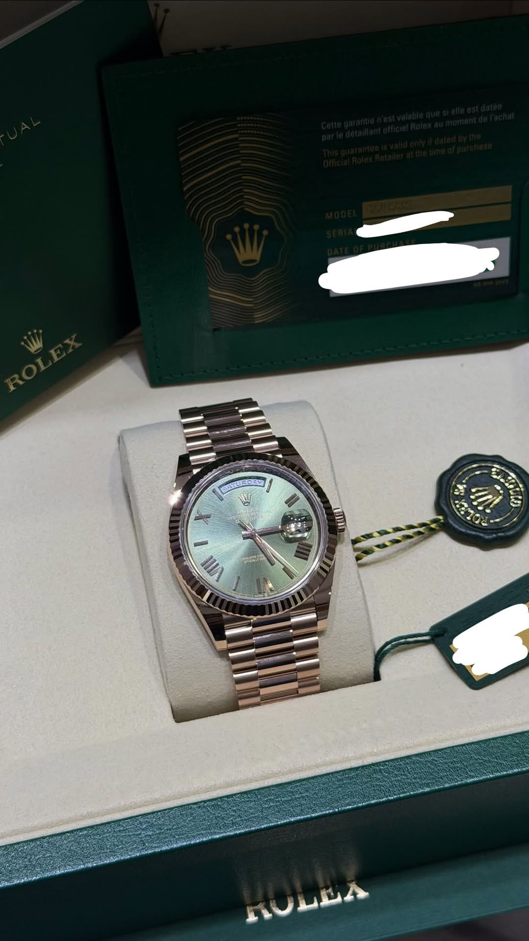 May be an image of wrist watch and text