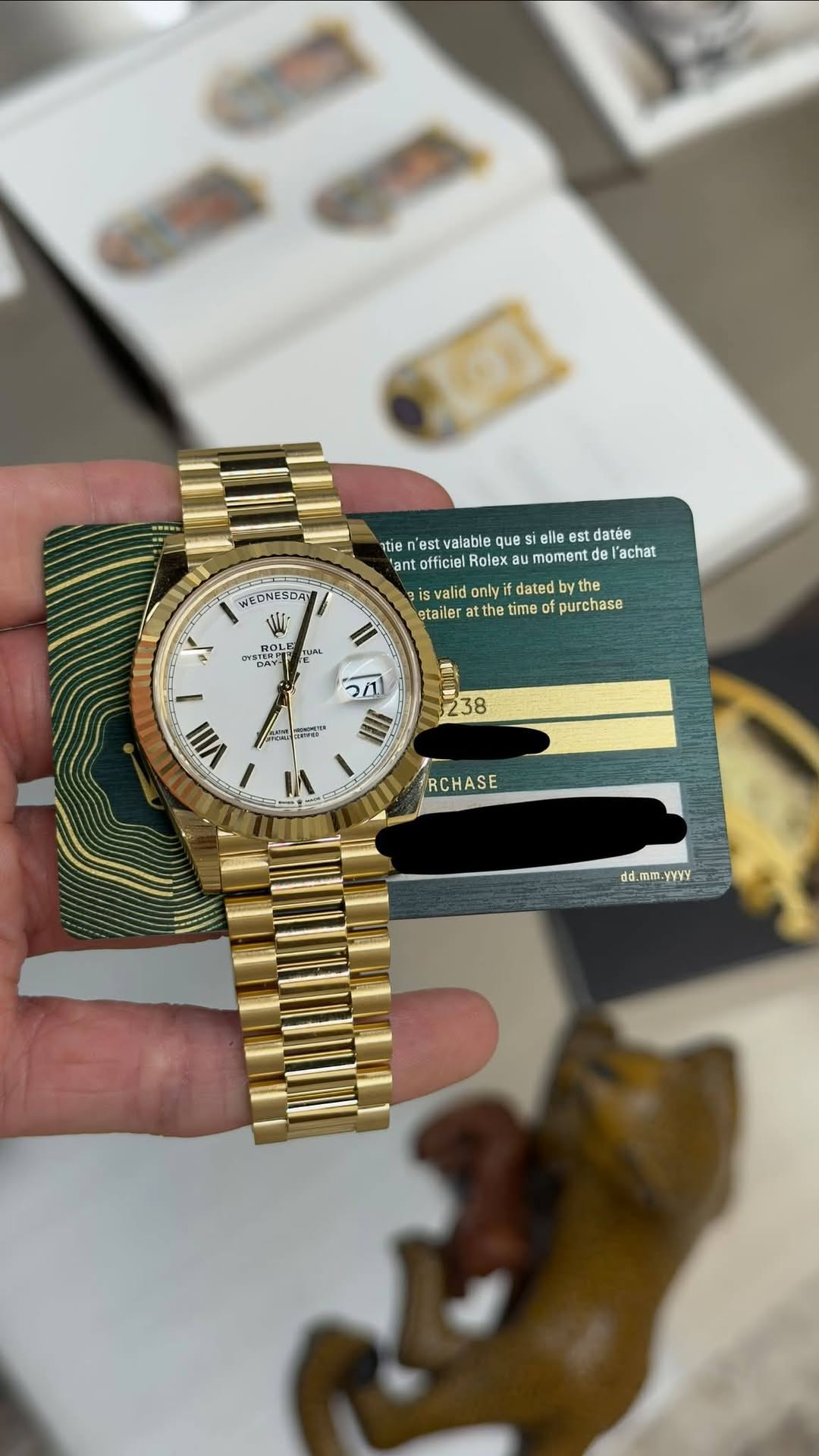 May be an image of wrist watch and text