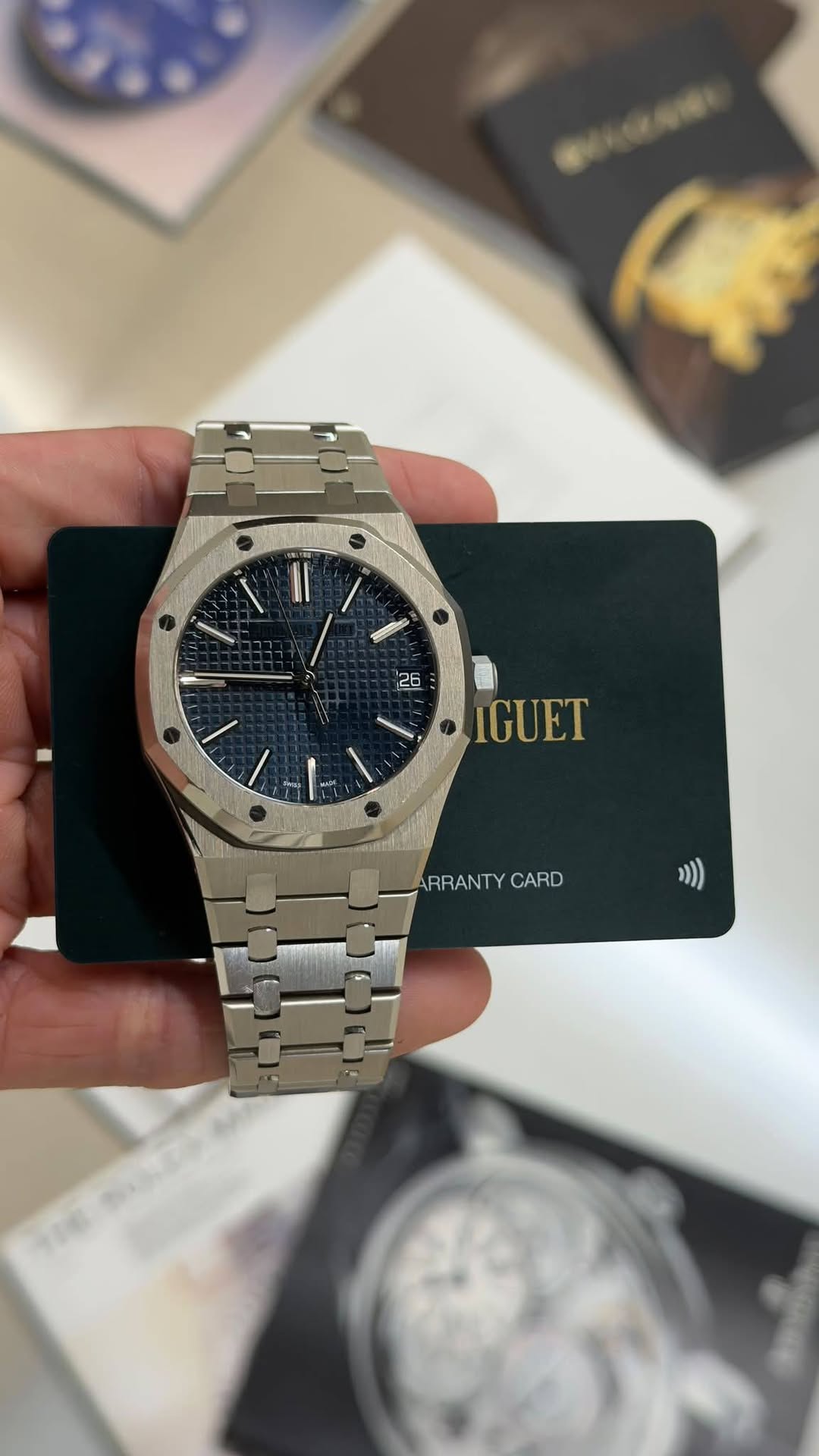 May be an image of wrist watch and text
