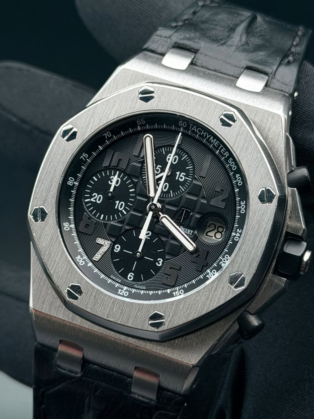 May be an image of wrist watch and text