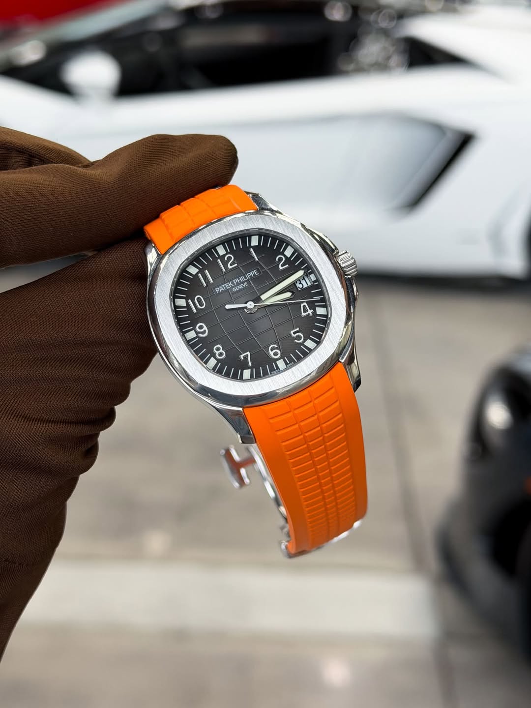 May be an image of wrist watch and text