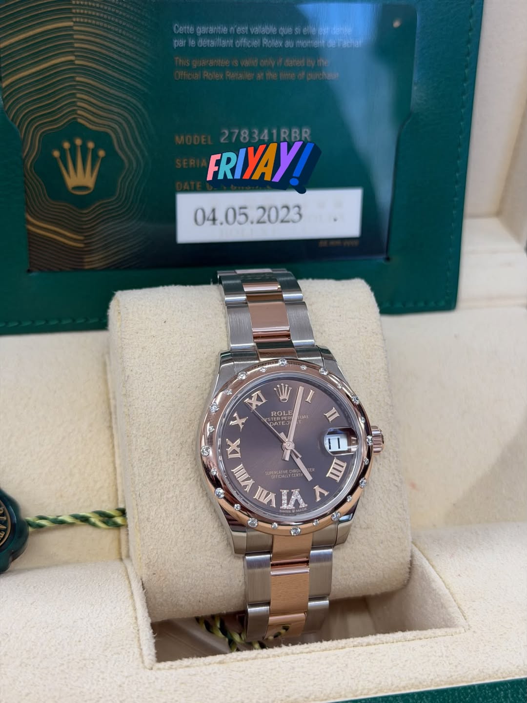 May be an image of wrist watch and text