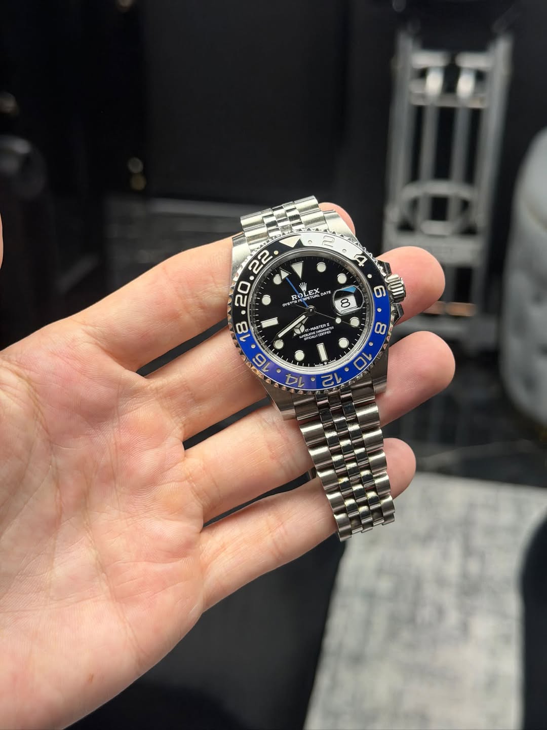 May be an image of wrist watch and text