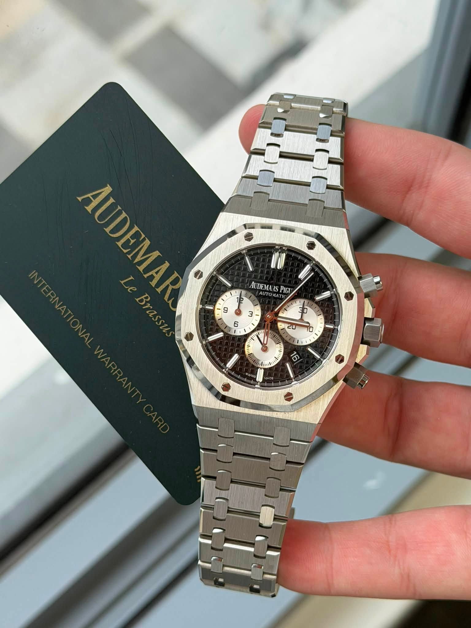 May be an image of wrist watch and text