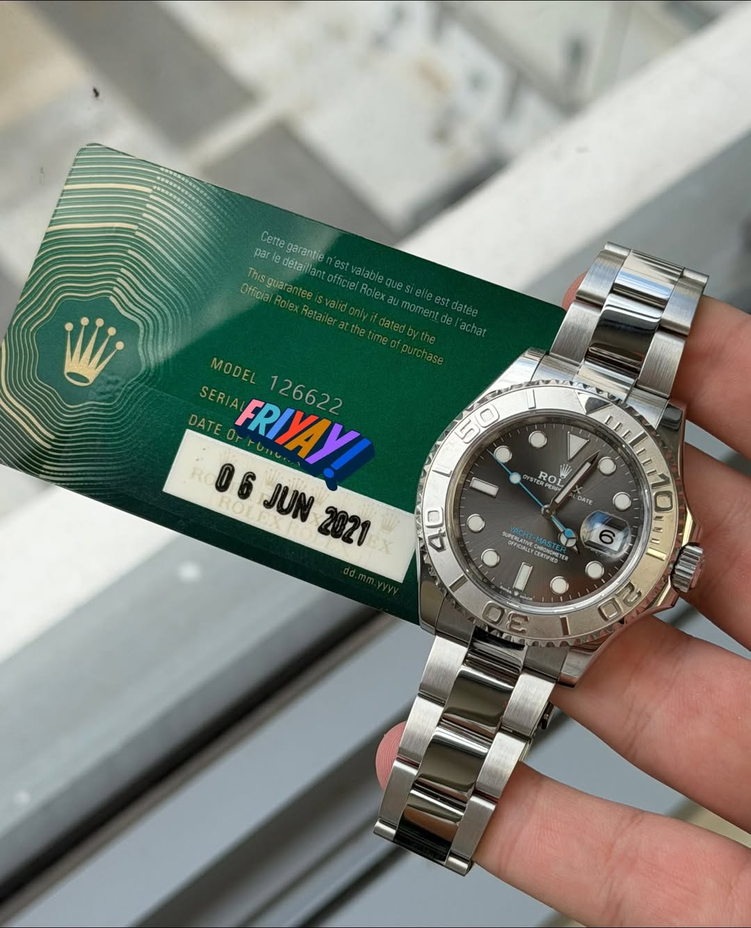 May be an image of wrist watch and text