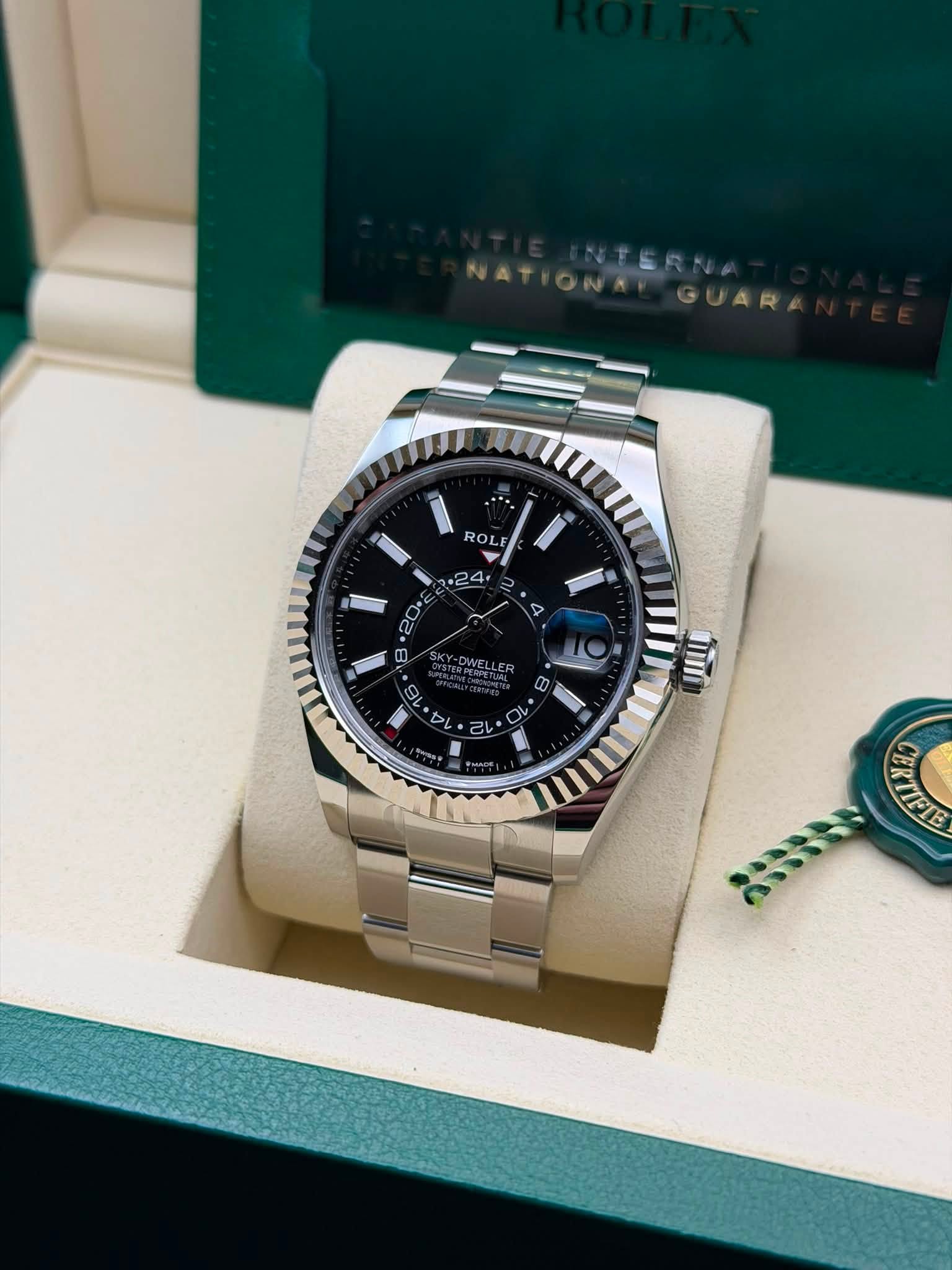 May be an image of wrist watch and text