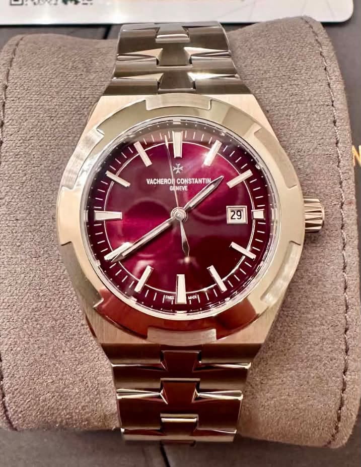May be an image of wrist watch and text