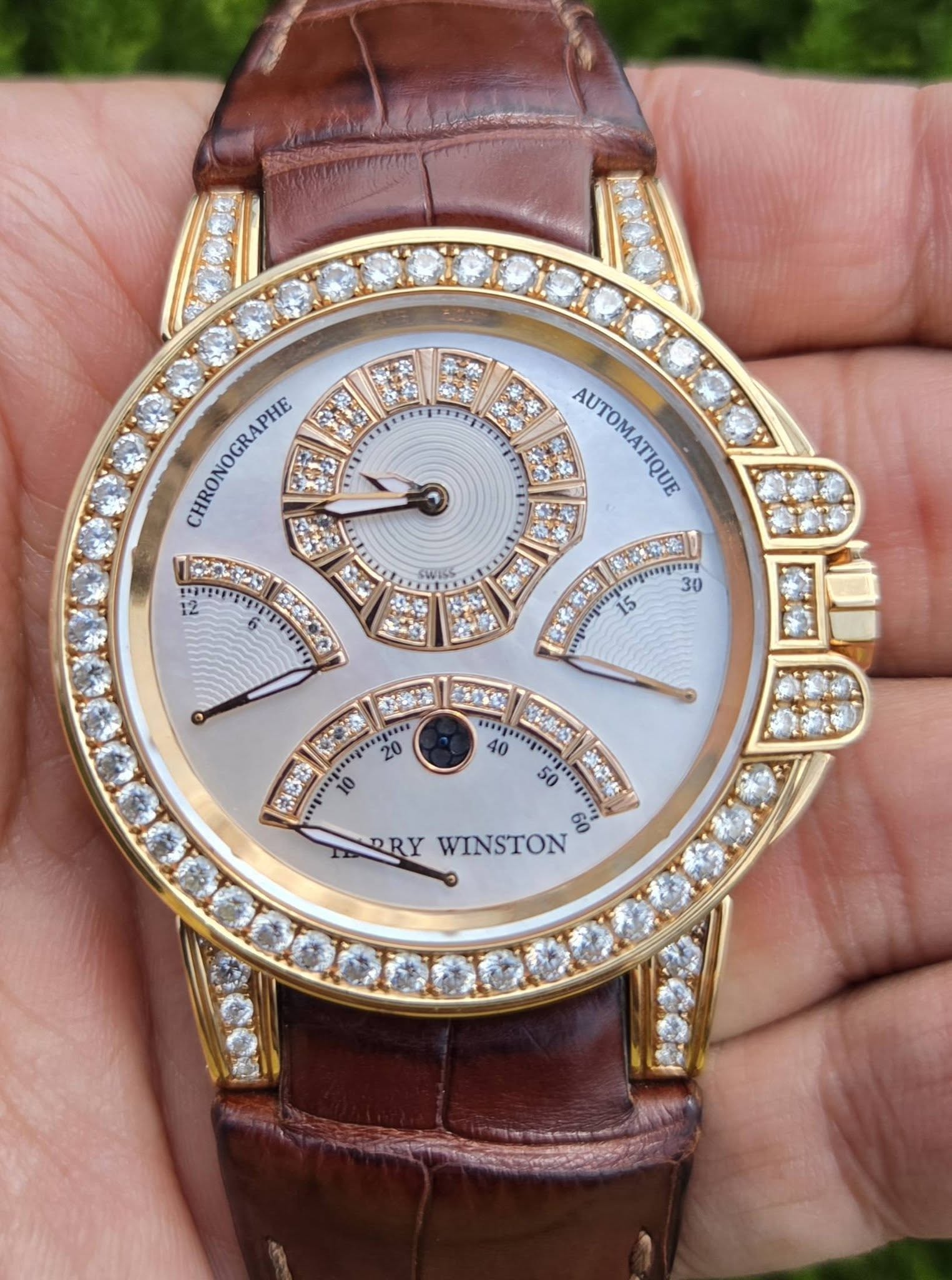 May be an image of wrist watch and text