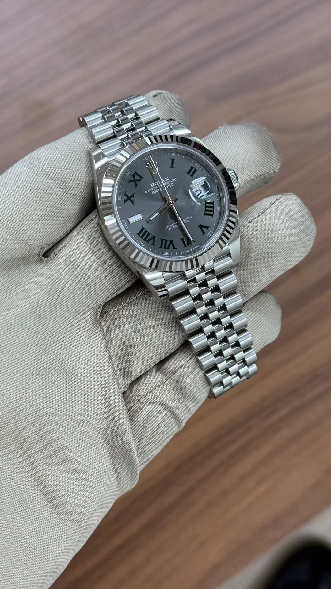 May be an image of wrist watch and text