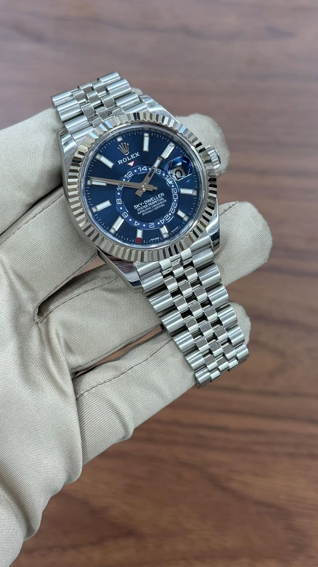 May be an image of wrist watch and text