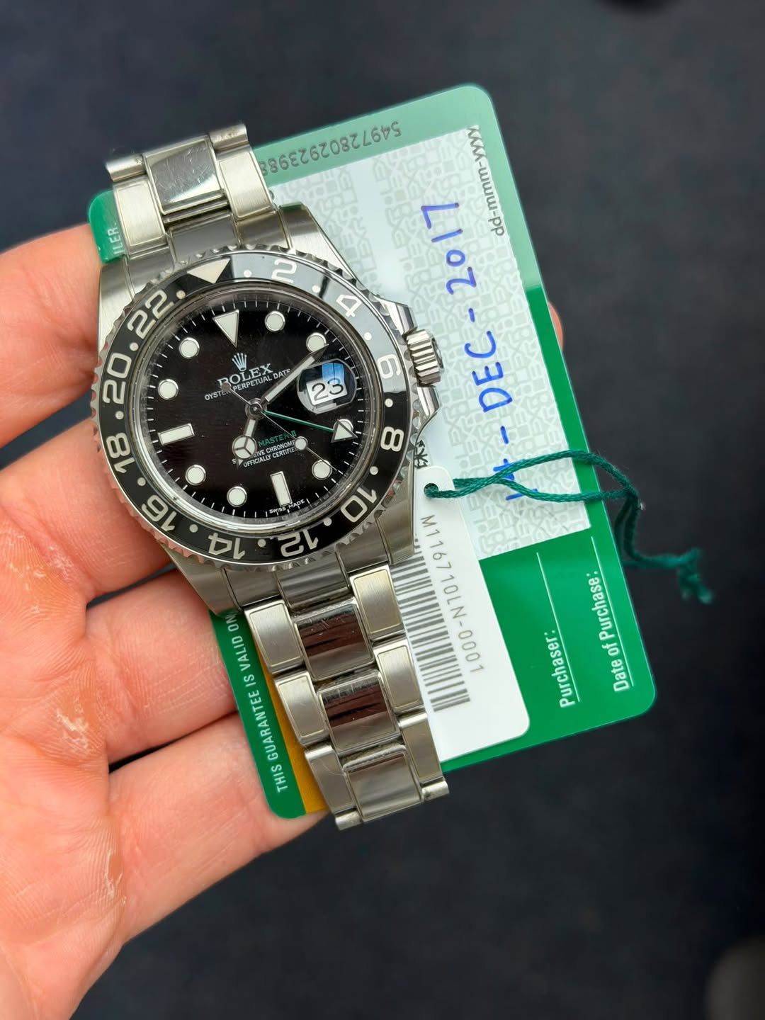 May be an image of wrist watch and text that says 'MAGTN ROLEX MASETUNDATS นอร DITS OYST 23 ن M RORCN 86EZ620822675 dd-mmm-yyyy my 4 O! D 8 III LIOZ-JEC- DEE 10 12 M116710LN-000…