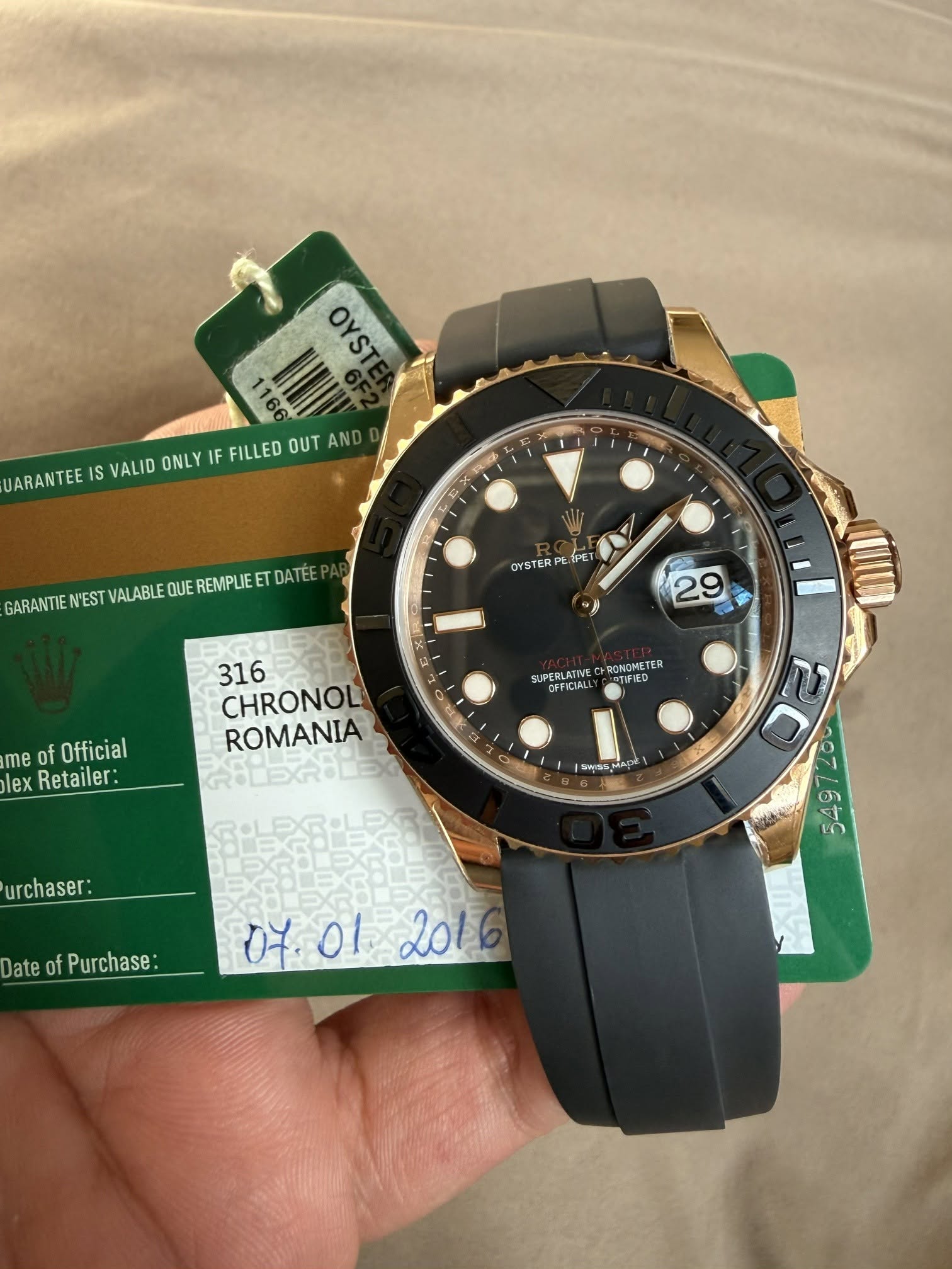 May be an image of wrist watch and text that says '7 ARANTEE IS VALID ONLY IF FILLED OUT AN ن GARANTIE 'EST ALABLE QUE REMPLIE DATE PET OYSTER 29 Te of Official lex Retailer:…