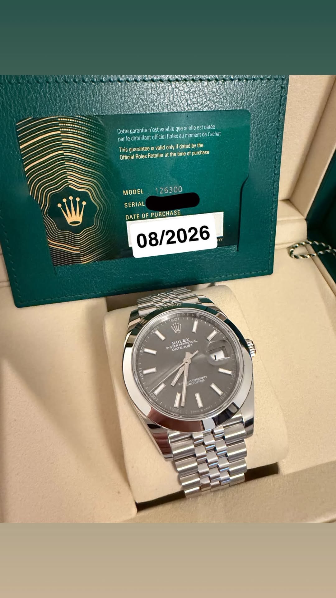 May be an image of wrist watch and text